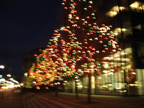 Returning from work, I wish my life were as colourful as these christmas lights. "I WALK THE LONEY ROAD"