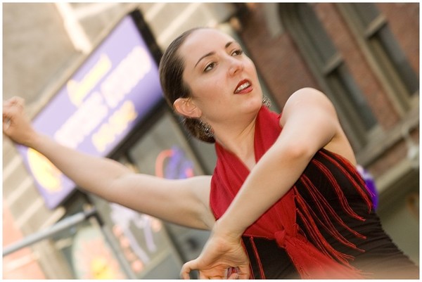A performer doing Tango at Younge Street Festival in Toronto July 8