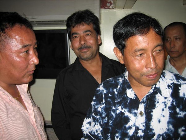 Gagan (middle) checks if all guests had the 'request sheets' (Farmais?) for Sapana.