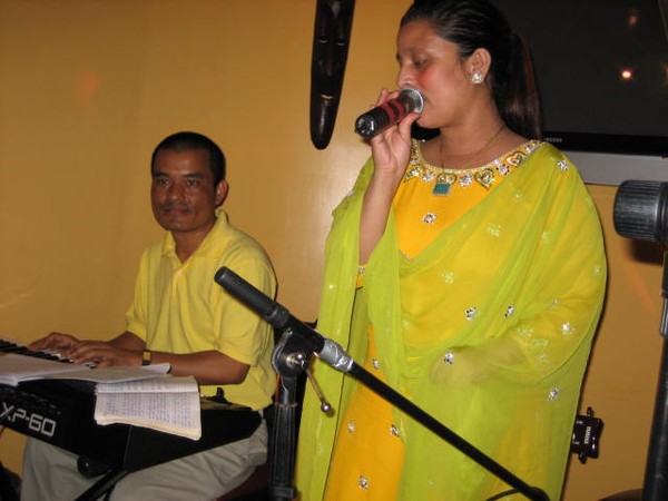 On Bimal Budathoki's keyboard sits Sapana's unending book of lyrics.