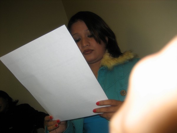 Sindhu Malla going over the program. 