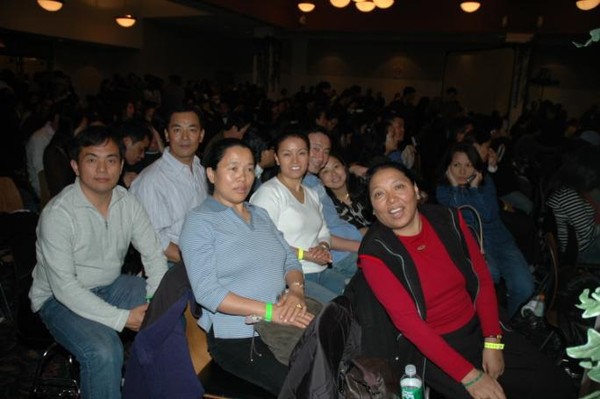 Audience pose for camera... As someone on the cell goes, "Can't hear you".