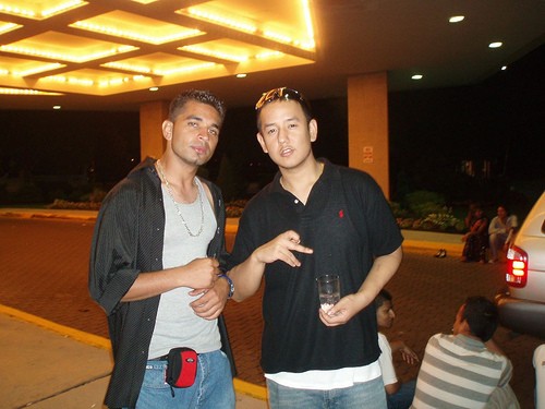 DJ AJ n sum made up gang sign