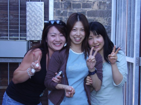 3 japanese with wold peace