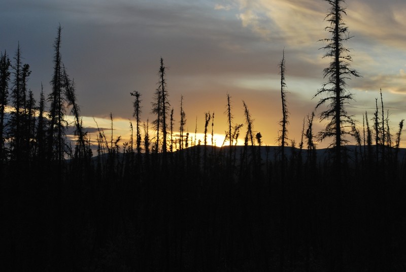 Sunset around 3:00 am at Yukon River along Dalton Highway